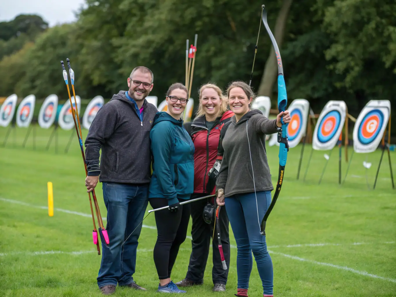 A vibrant photo of Massilia Arc Club members celebrating a successful archery event, showcasing the club's strong sense of community.